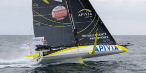 Charlie Dalin aboard his Imoca at the start of the Vendée-Arctique